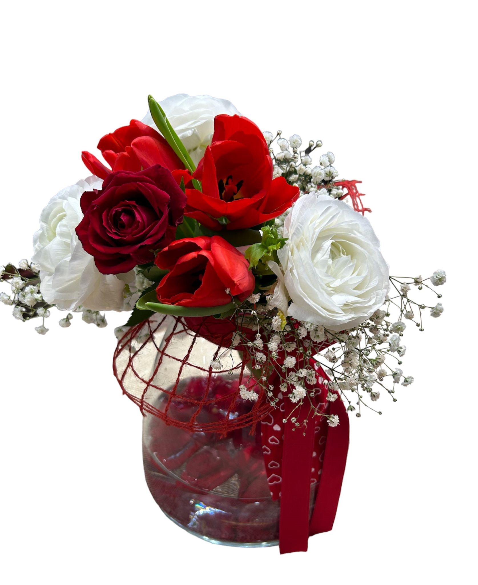 Composizione di rose rosse in vaso di vetro